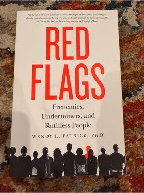 Red Flags — White and Red Paperback Book by Wendy L. Patrick, Ph.D.